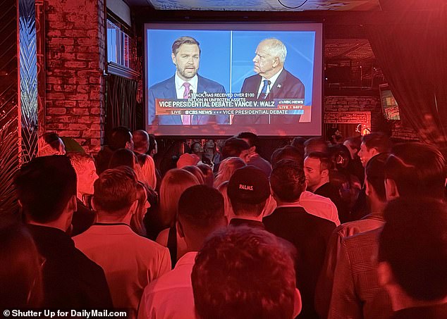Daily Mail: a Make America Hot Again crowd watching the vice presidential debate